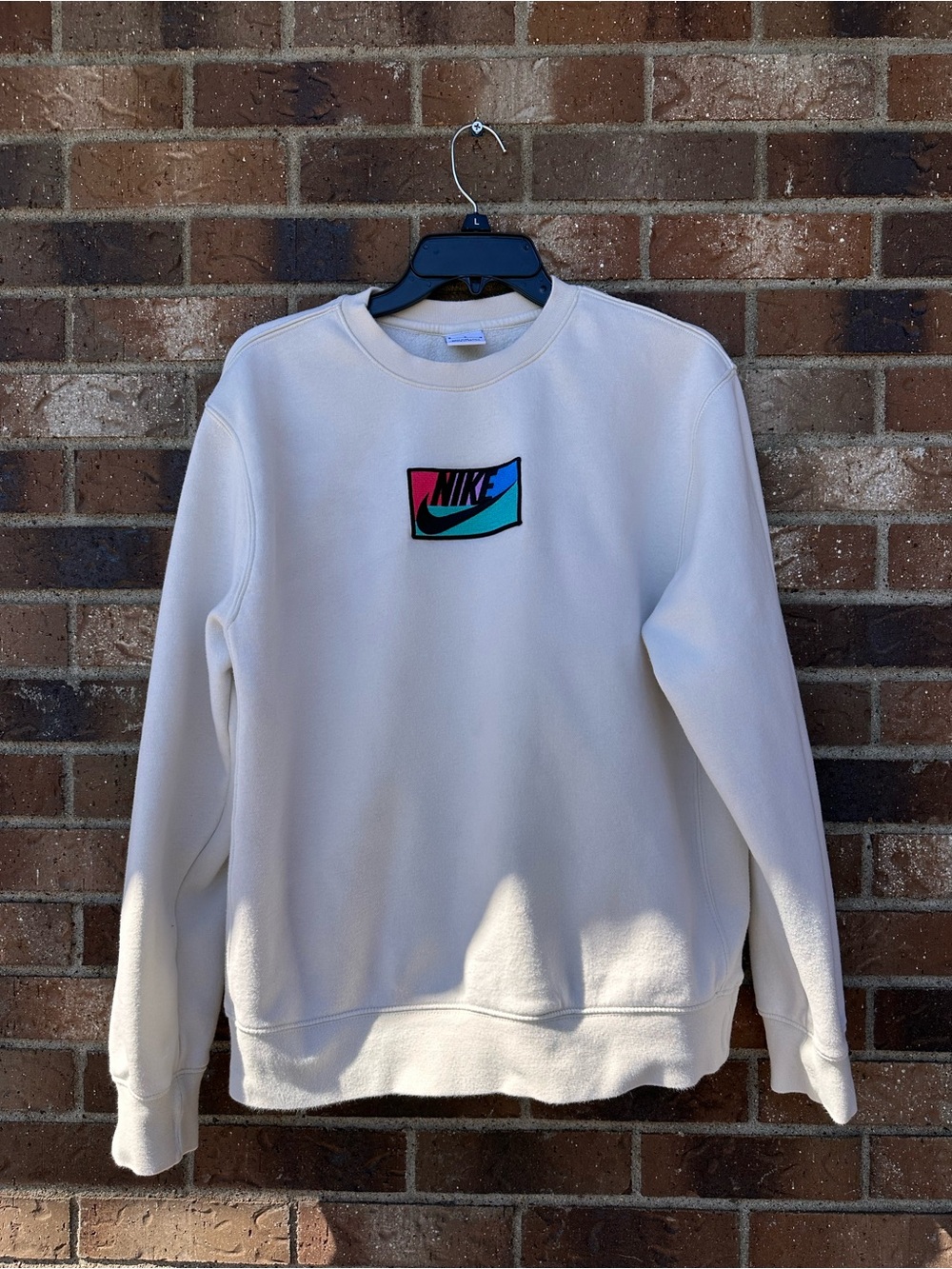 Nike Cream Crewneck with Pink and Teal Colorblock Logo
